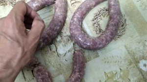 Краковская колбаса в коптильне.