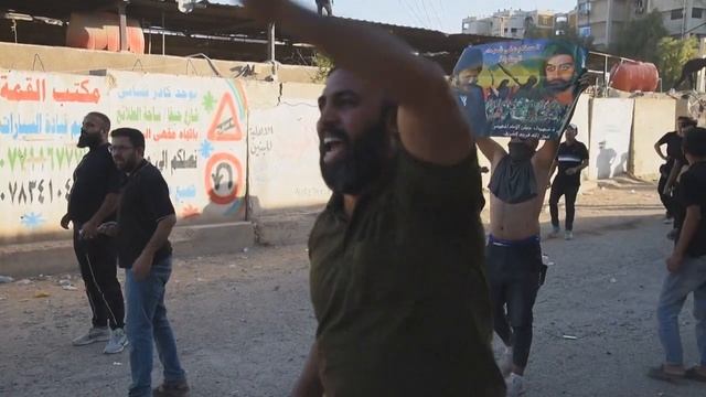 Protesters clash with security forces near the Swedish embassy in Baghdad | AFP смотреть онлайн
