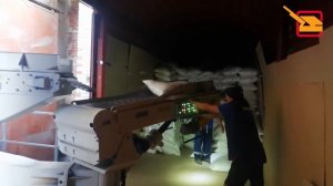Мешкопогрузчик мешков с сахаром в вагоны, линия паллетирования сахара в мешках