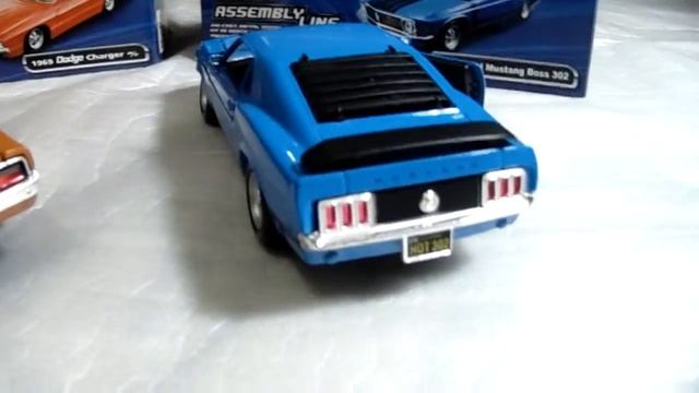 Maisto Assembly Line 1/24 -- 1969 Dodge charger R/T -- 1970 Ford Mustang Boss 30 смотреть онлайн