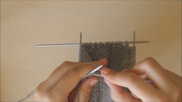 Шапочка с косами и кисточкой