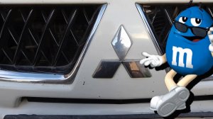 Предохранитель прикуривателя в подлокотнике и багажнике Mitsubishi Pajero Sport.