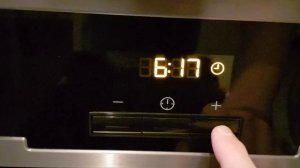 Выставить время на духовке Electrolux