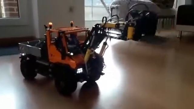 Lego Technic Unimog u400 8110 mit frontlader смотреть онлайн