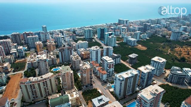 Купить квартиру в Турции у моря от застройщика. Квартиры в Махмутларе. Недвижимость в Турции. Алани смотреть онлайн