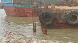 Углубление дна возле  причальной стенки