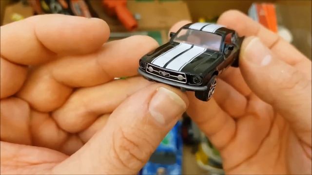 Lots of models and toys of new and used cars in a big box смотреть онлайн