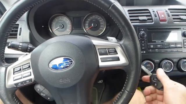 Subaru Forester изготовление дубликата чип ключа зажигания с кнопками в Минске. Key programming смотреть онлайн
