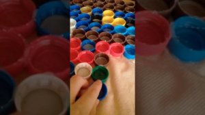 Поделка.Коврик-массажер из крышек