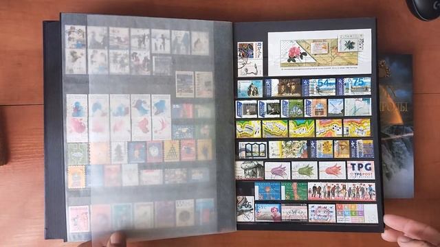 Филателия. Альбом с марками отсортированными по странам: ФРГ, Голландия, Швеция, Индия и др. смотреть онлайн