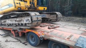 Погрузка экскаватора на трал