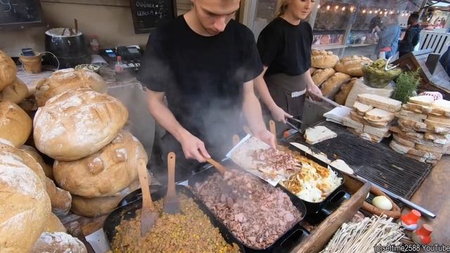Уличная еда в Кракове, Польша. Огромные колбаски, свиные рульки, стейки, шашлычки и многое другое. смотреть онлайн