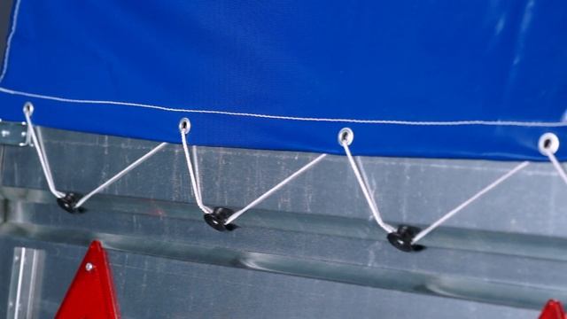Обзор одноосного прицепа Гранит размерностью 2000х1300 мм. с низким тентом 350 мм. смотреть онлайн