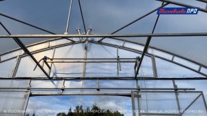 Видеообзор торцевой форточки с цепным редуктором в промышленной теплице Супермодуль.