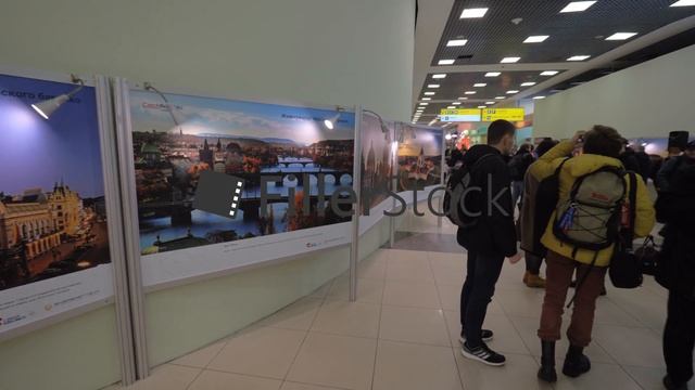Visitors at Prague photo exhibition in Sheremetyevo Airport, Moscow смотреть онлайн