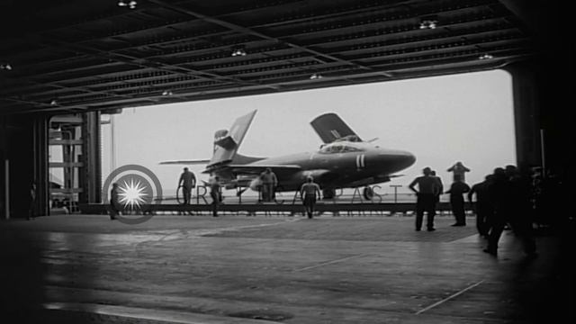 US FJ-2 Fury and F3D Skyknight on deck of USS Hancock CV-19 in the Pacific Ocean. HD Stock Footage смотреть онлайн