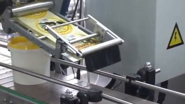 Этикетавтомат нанесения этикетки на пластиковое ведерка с майонезом смотреть онлайн