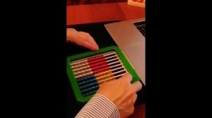 Считаем  примеры на время с помощью детских счётов.