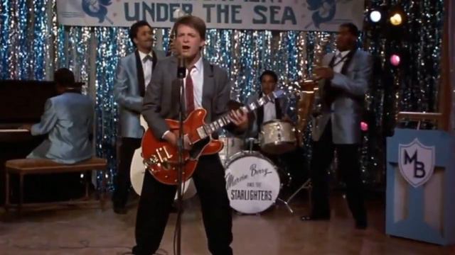 Марти Макфлай отжигает на гитаре смотреть всем Назад в Будущее