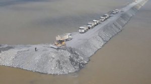 Строительство, возводим насыпные дамбы