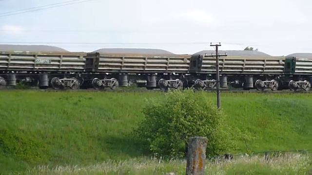 Тепловоз 2ТЭ116-443 с товарным поездом, с думпкарной вертушкой смотреть онлайн