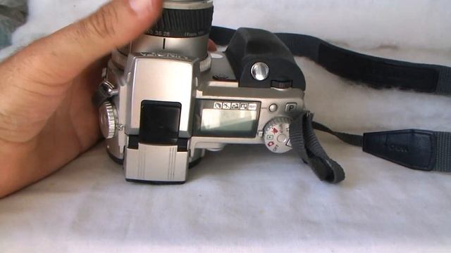 Minolta Dimage 7i смотреть онлайн