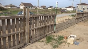 Временный забор из поддонов