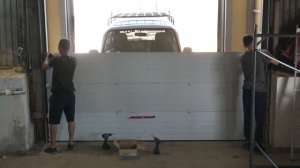 Ремонт промышленных секционных ворот DoorHan