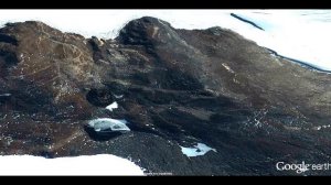 Оттаявший НЛО на Антарктиде (рядом капсула или саркофаг с пришельцем))