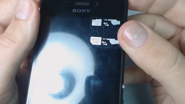 How to put sim card and memory card on Sony Xperia M2 D2303 смотреть онлайн