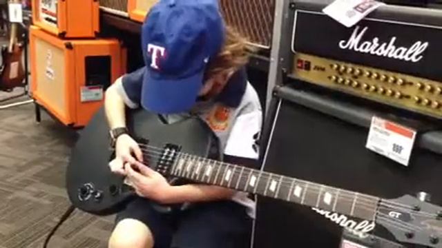 Virtuoso 6YO Tristan Playing "Limelight" by Rush on an Epiphone Special-II GT @ Guitar Center. смотреть онлайн