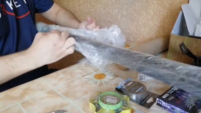 Распаковка посылки из Мультифиш (Сабанеев мастер поле 400 и Сабанеев Фотон Боло 600) смотреть онлайн