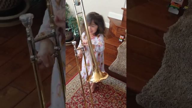 Cute 3 year old playing Trombone 1st time. смотреть онлайн