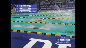 Натали Куглин в плотной борьбе выигрывает касание на 100 м Баттерфляй