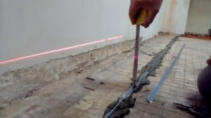Выставление маяков для тонкого слоя заливки стяжки