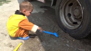 Truck stuck in the mud - Rubble ride on power wheels tractor to help