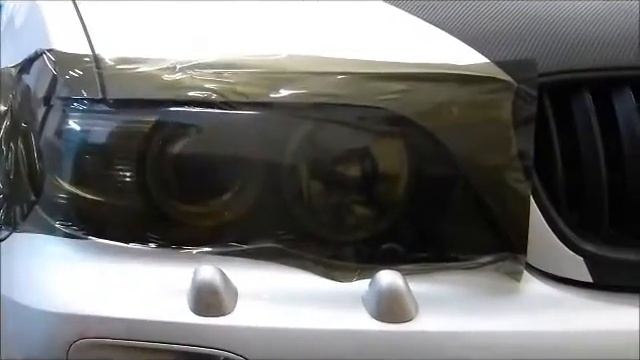 Тонировка передних фар черной пленкой у BMW смотреть онлайн