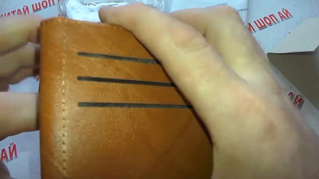 Посылка с AliExpress.Кошелёк мужской из PU кожи. смотреть онлайн