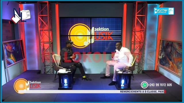 Adolf Tata Mobitsh fait la promo de son album " pièce contre pièce" en exhibant ses habits à la tél смотреть онлайн