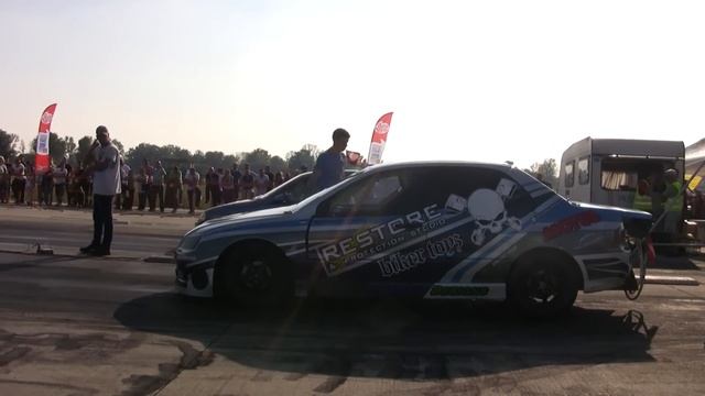 Mitsubishi Lancer EVO IX Vs Opel Corsa смотреть онлайн