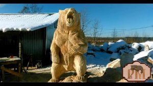 Резьба бензапилой Большого деревянного медведя