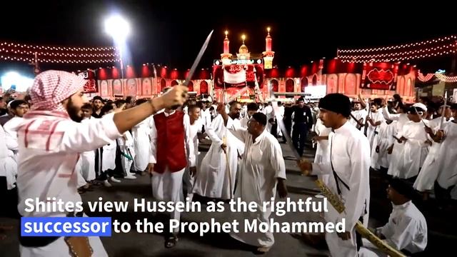 Shiite Muslims mark Ashura in Iraq's shrine city of Karbala | AFP смотреть онлайн