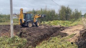 Экскаватор LiuGong 777 A-S - расчищаем китайцем дренажную канаву и делаем заезд на участок.