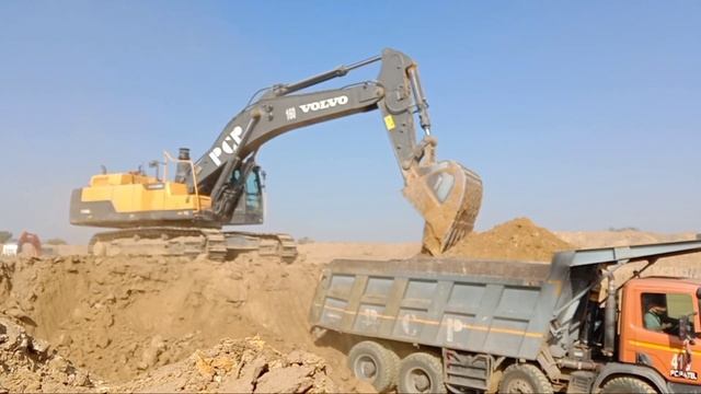 Volvo EC480DL Excavator Loading Scania Trucks