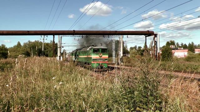 Тепловоз 2ТЭ116-403 с грузовым / Dieselloc 2TE116 with freight train смотреть онлайн