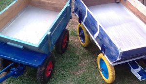 Две четырёх колёсные тележки .