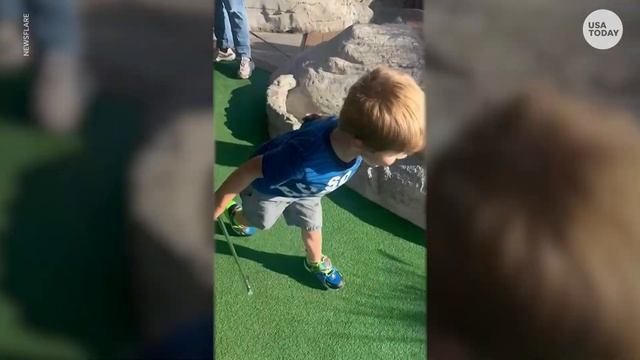Kid bends the rules to get a hole-in-one at a putt-putt in Florida | USA TODAY смотреть онлайн