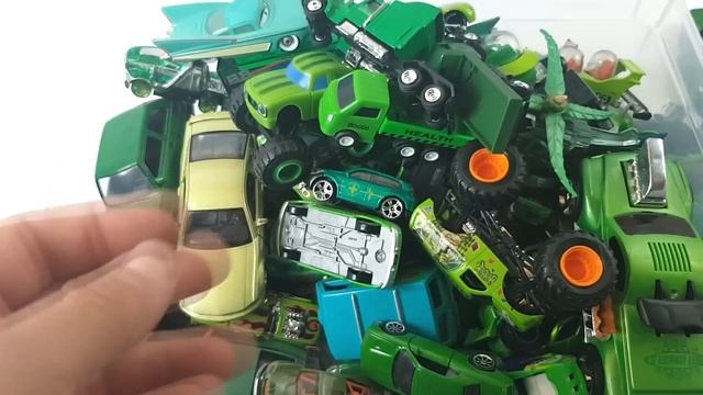 Lots of green cars of various sizes in box смотреть онлайн