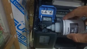 how to refill ink canon g2010 printer