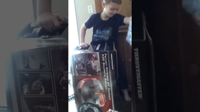Parker Jax Christmas morning getting his Thrustmaster Ferrari Scuderia Edition Cockpit смотреть онлайн